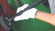 a person holding a large black and white object